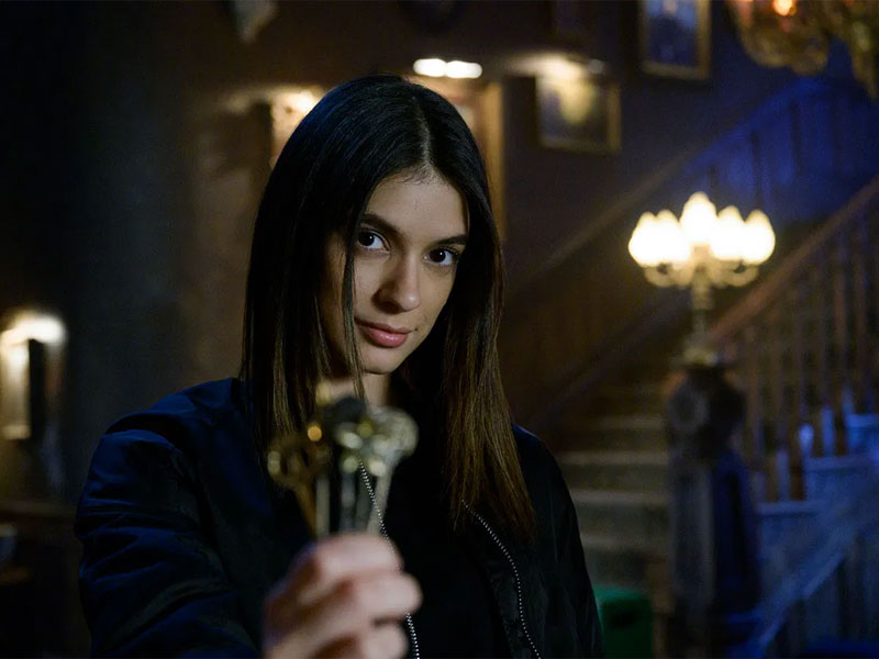 Dodge holding keys from "Locke & Key"